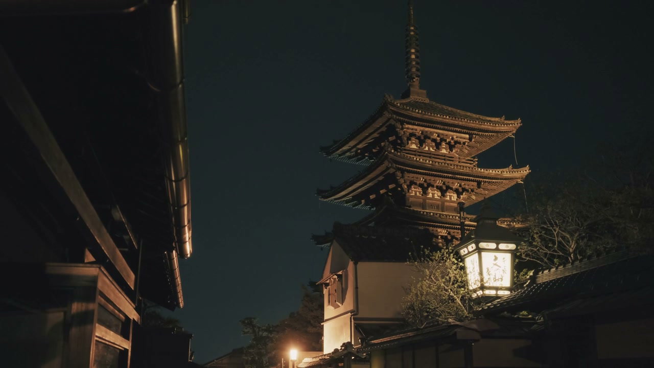 Illuminated Japanese Pagoda at Night