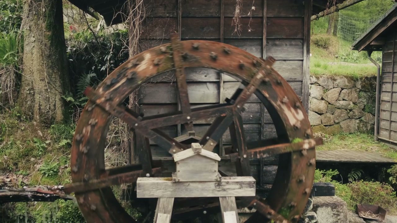 Traditional Japanese Waterwheel Spinning