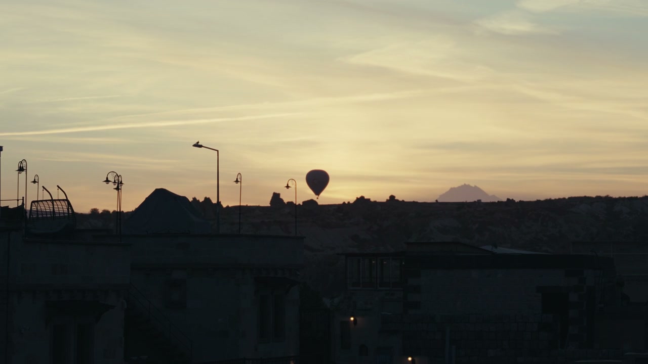 Hot Air Balloon Floating Over Cappadocia Sunset