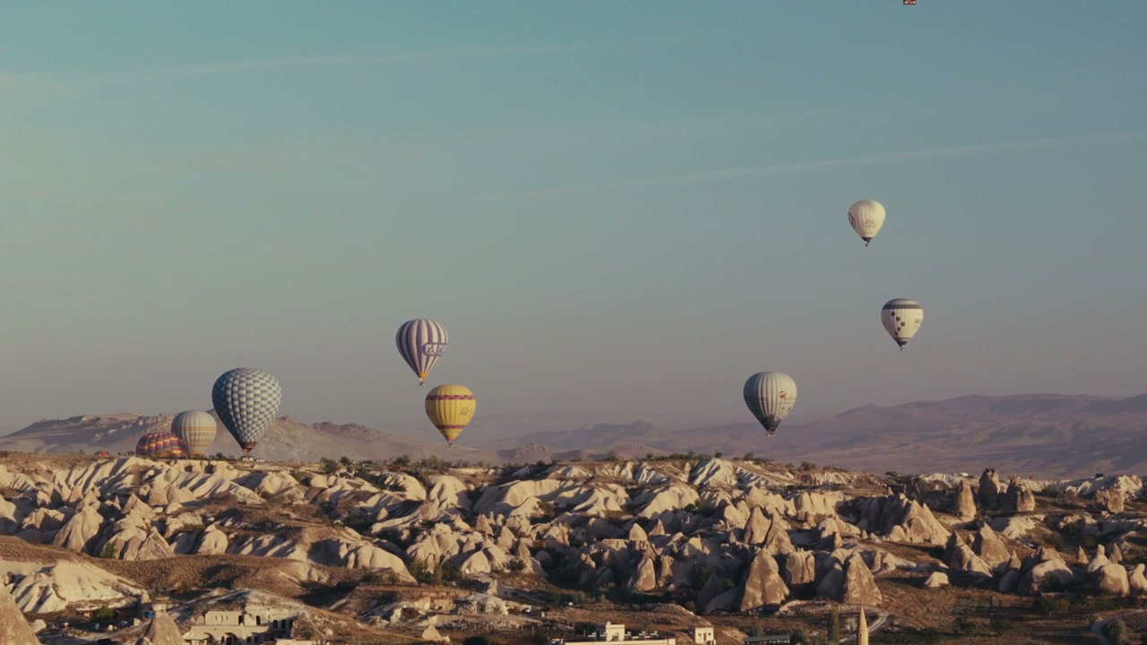 Hot Air Balloons Over Cappadocia Landscape