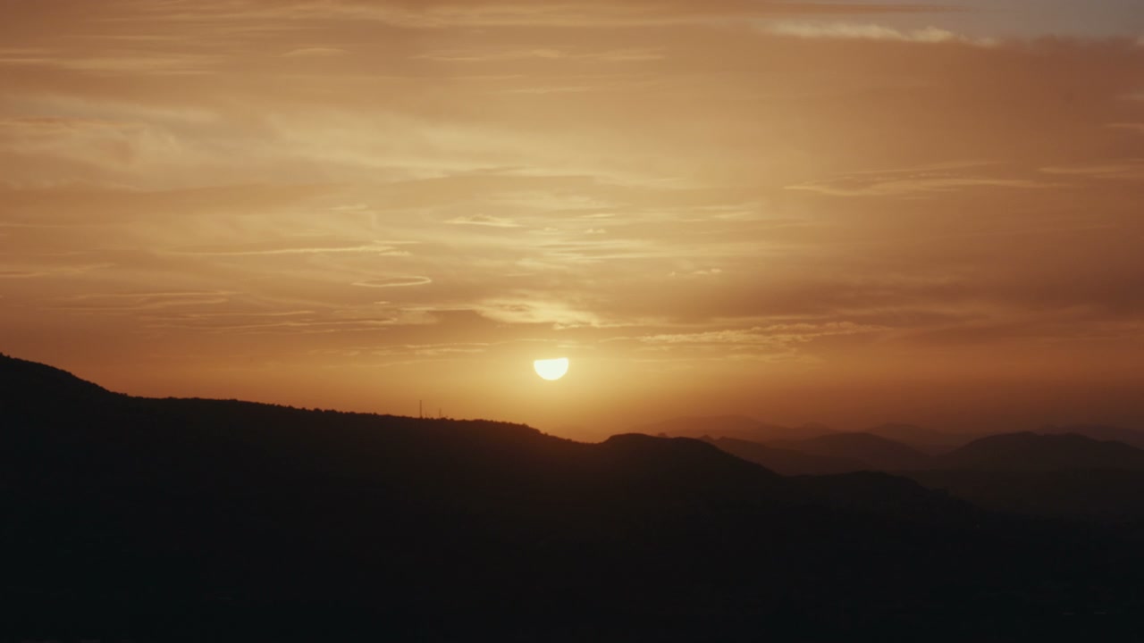 Golden Sunset Over Mountain Landscape