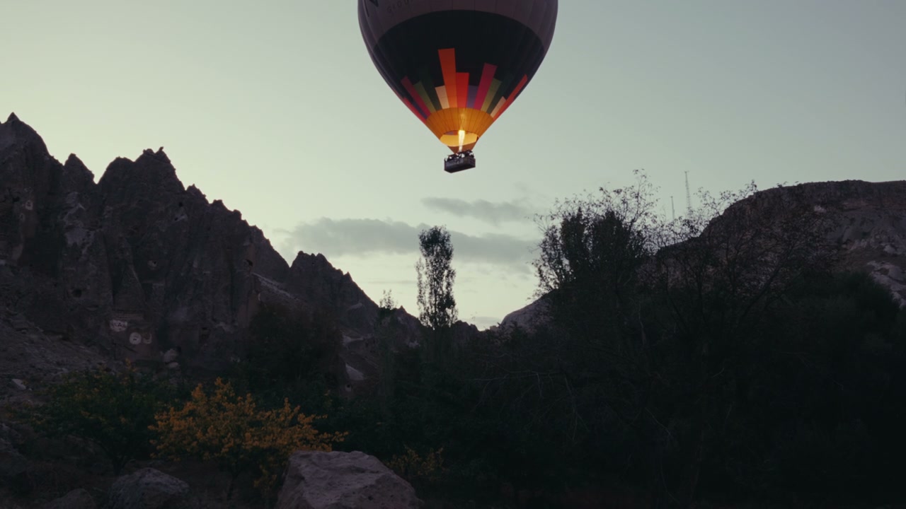 Hot Air Balloon Rising Over Cappadocia Valley