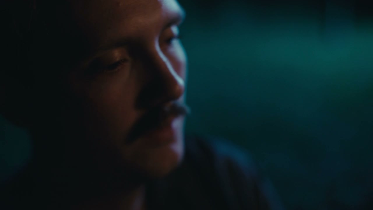Sad Man in Low Light Close-Up