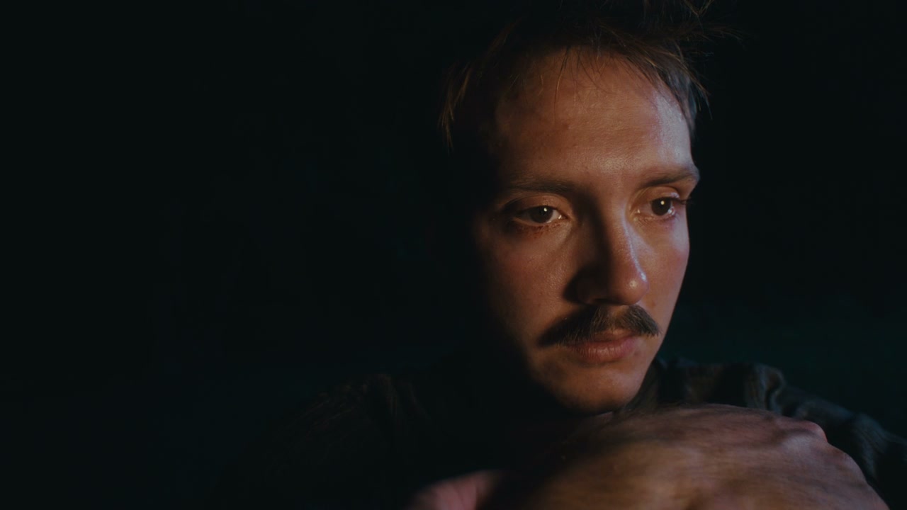 Heartbroken Man Close Up in Dark