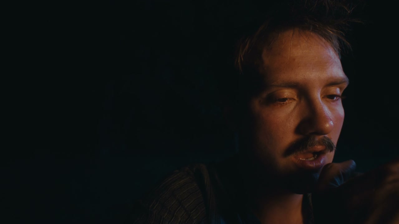 Pensive Man in Low Light