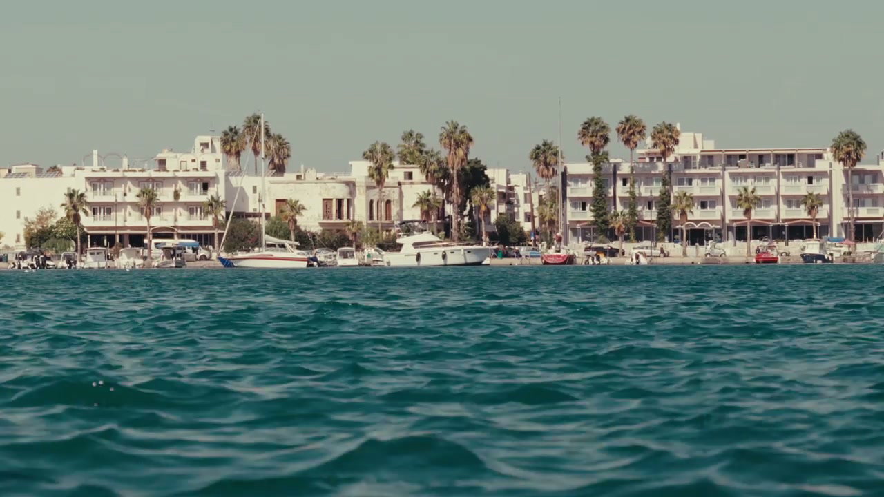 Coastal Town Across Turquoise Water