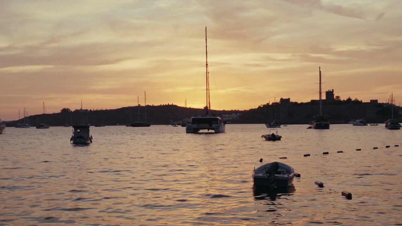 Boats in Coastal Bay at Sunset