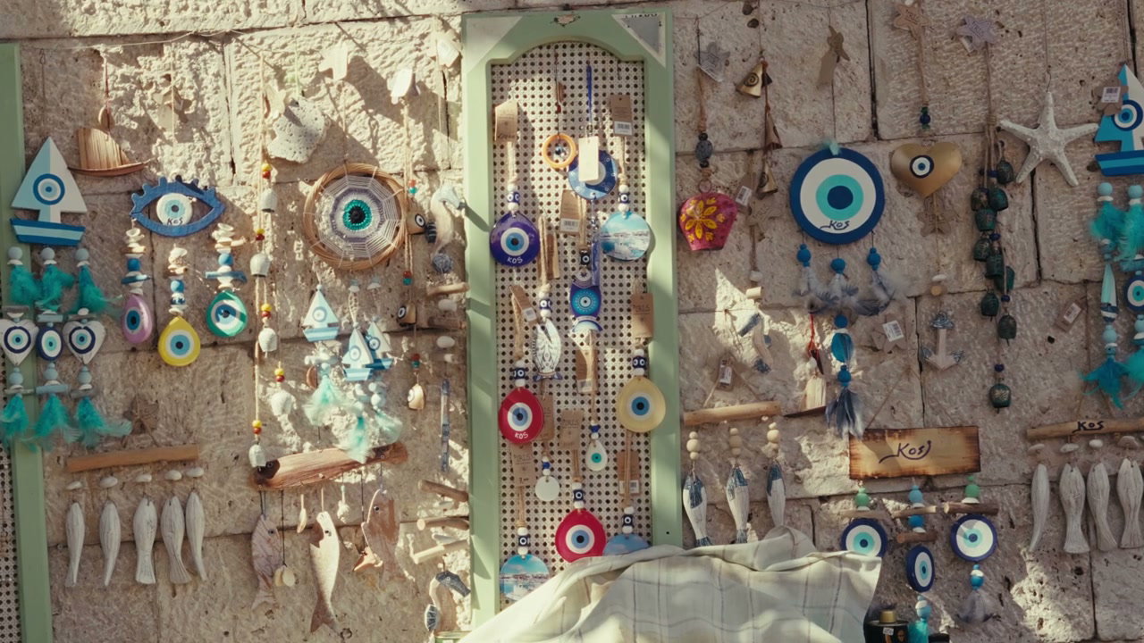 Evil Eye Charms Display on Stone Wall