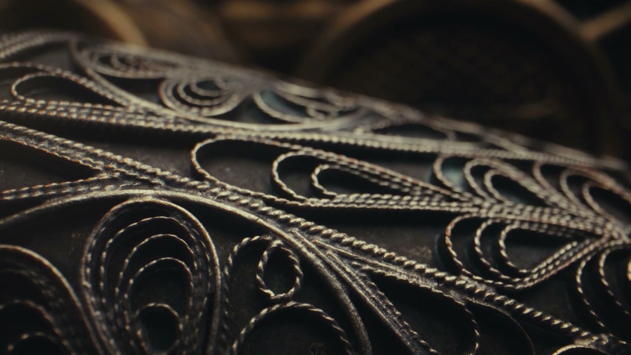 Intricate Metallic Filigree Pattern