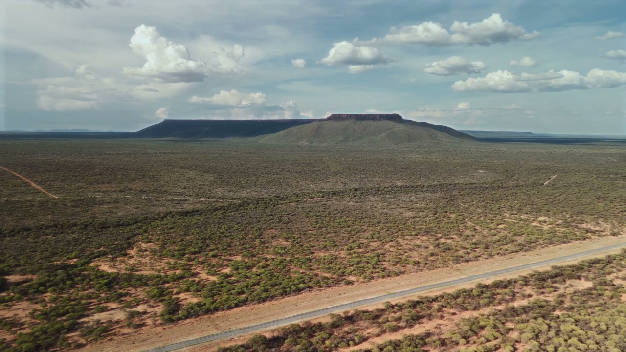 Vast African Savanna Landscape with Flat-Top Mountain