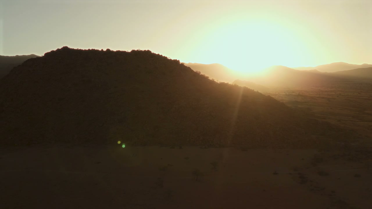 Desert Sunset Over Hills