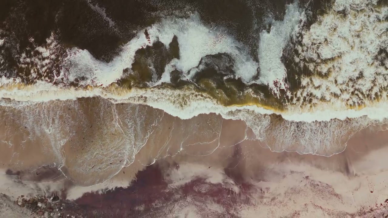 Aerial View Ocean Waves Crashing on Beach
