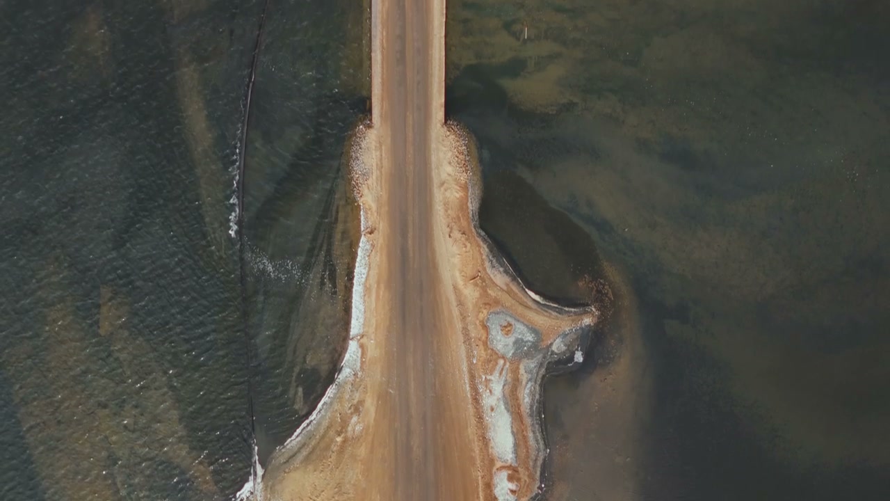 Aerial View of Dusty Coastal Causeway