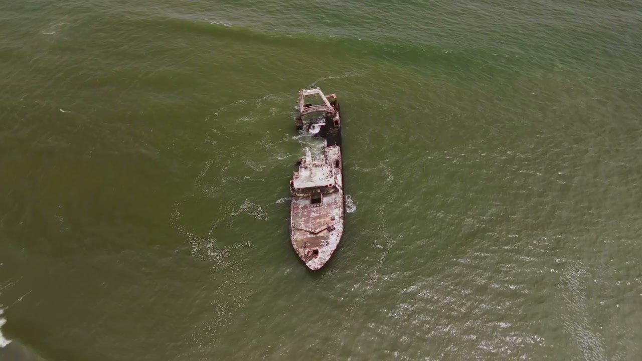 Rusty Shipwreck on Ocean Coast