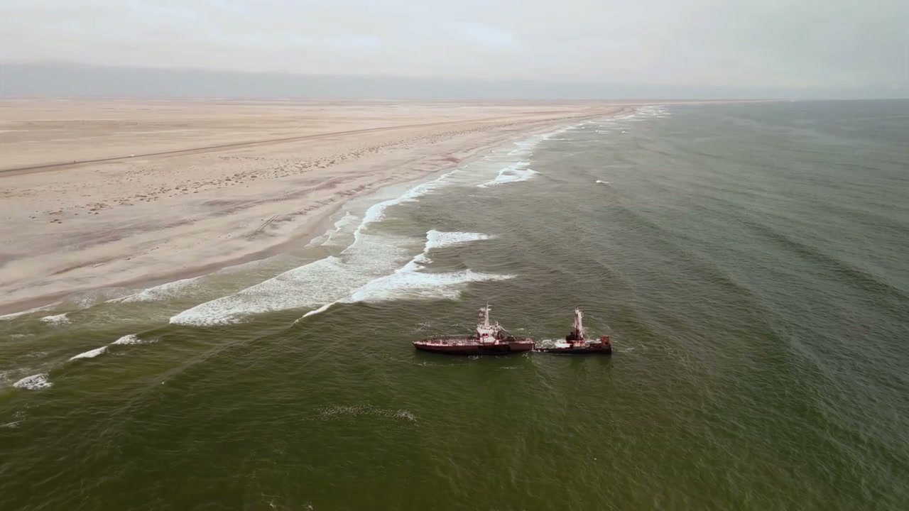 Abandoned Shipwreck on Desert Coastline