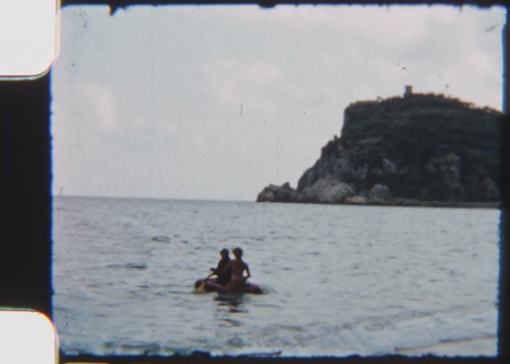 Vintage 8mm: People Paddling Inflatable Boat
