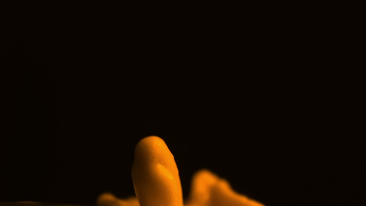 Dynamic Orange Liquid Splashes