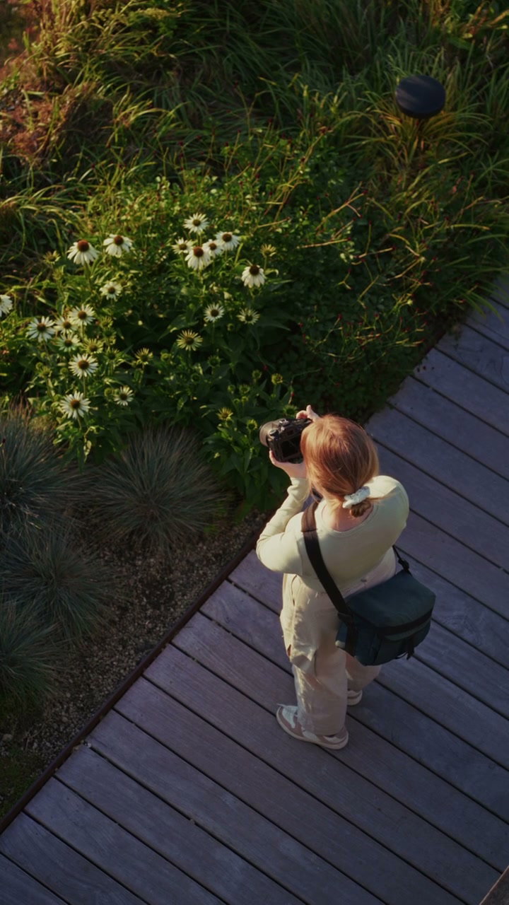 Photographer on Wooden Deck