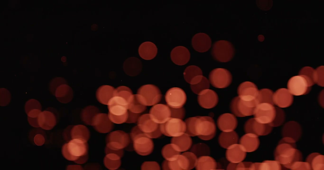 Abstract Reddish Bokeh Particles