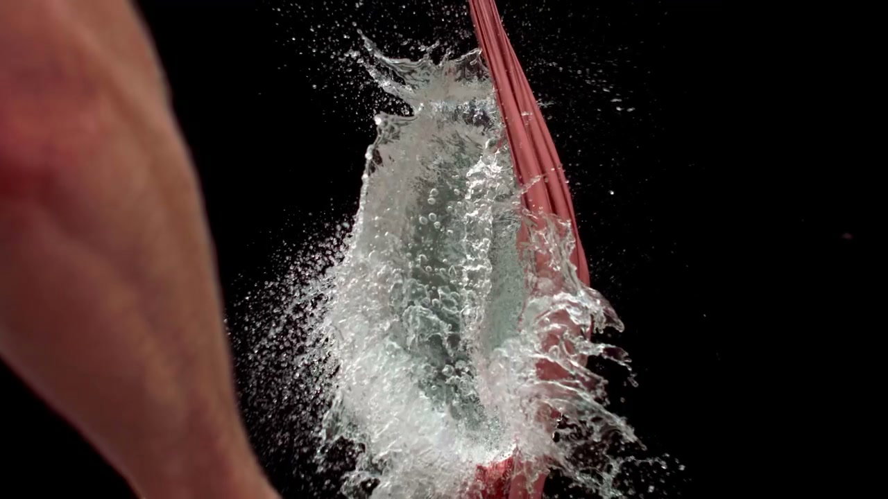 Water Balloon Bursting with a Knife