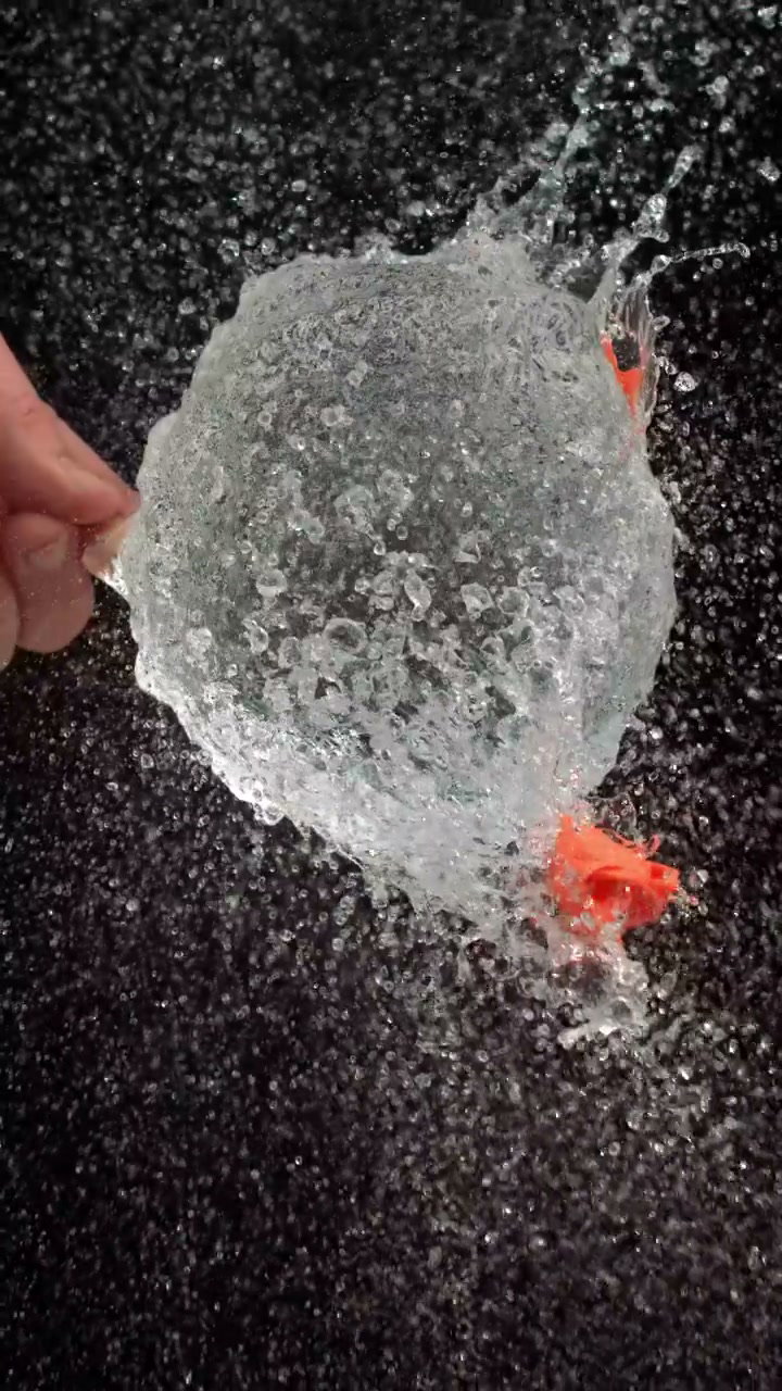 Water Balloon Bursting in Slow Motion • Stock Video on Uppbeat