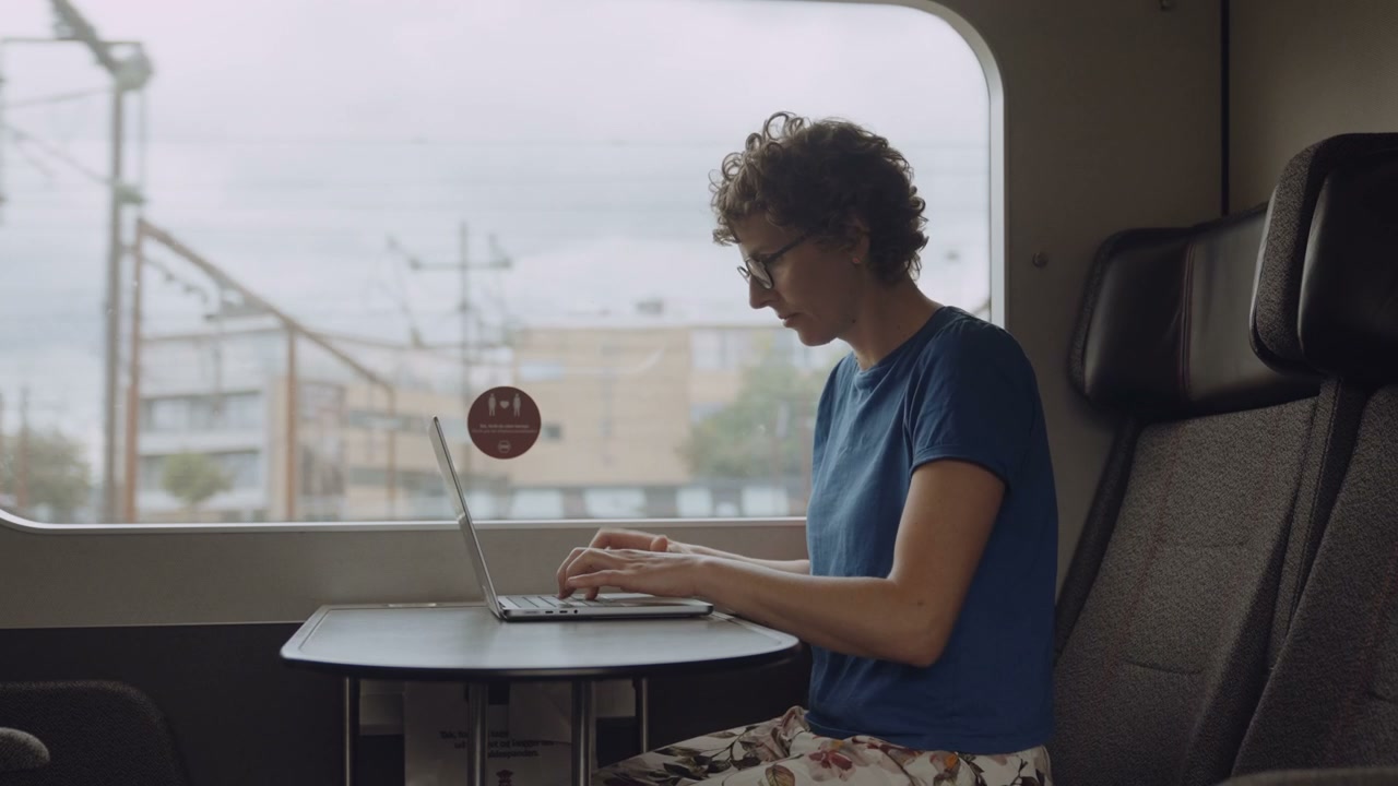 Woman Working on Train