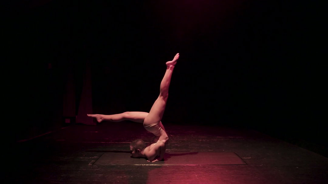 Contortionist Performing Flexible Pose on Stage • Stock Video on Uppbeat