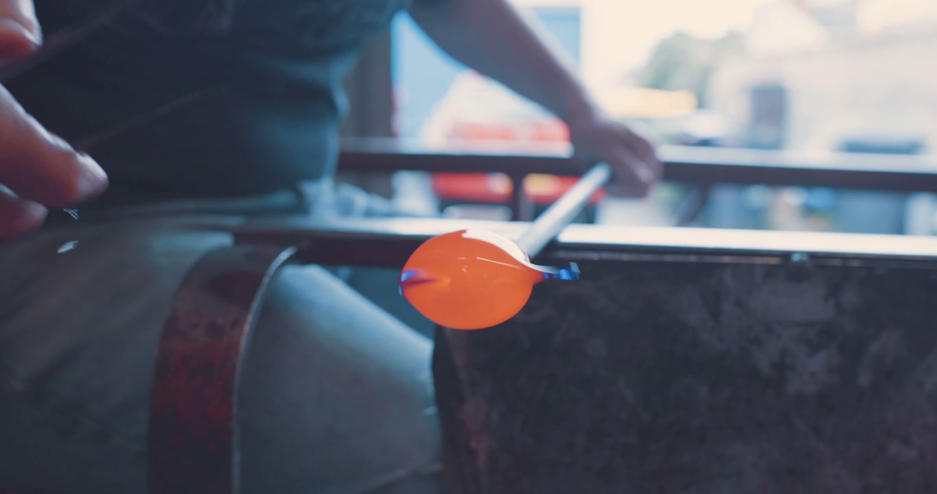 Glass Blower Shaping Hot Glass