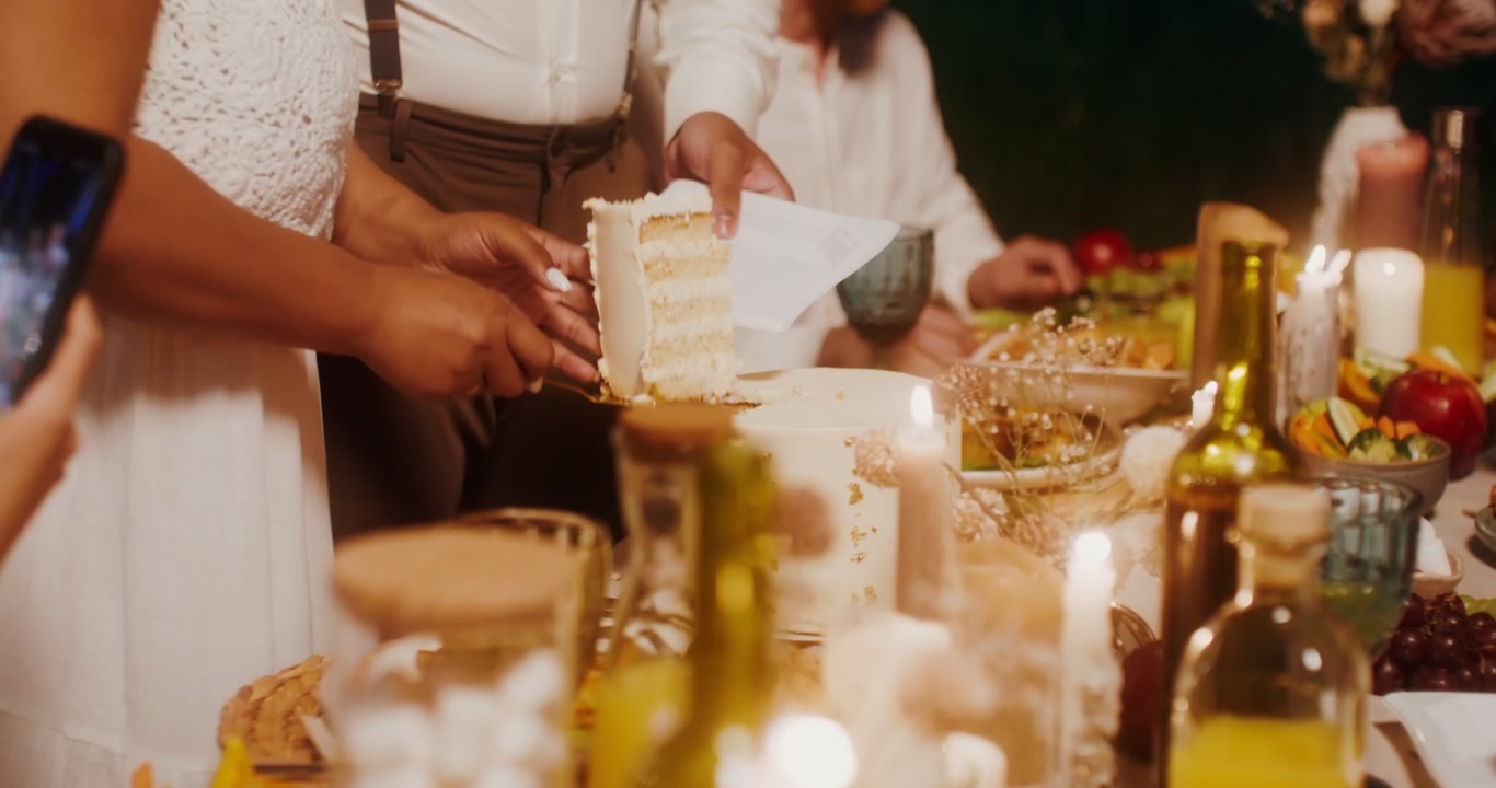 Couple Cuts Cake at Evening Celebration