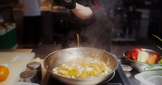 Large Pizza Baking in a Commercial Oven • Stock Video on Uppbeat