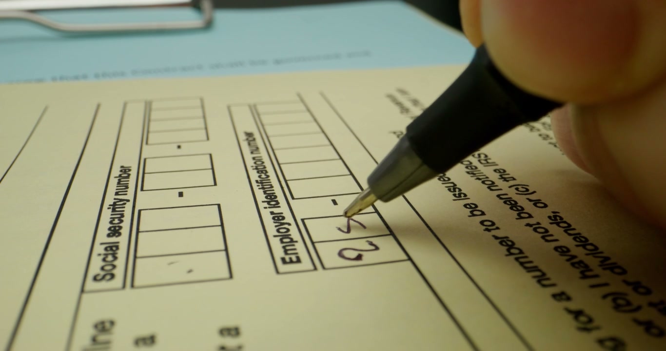 Person Filling Out Employer Identification Form