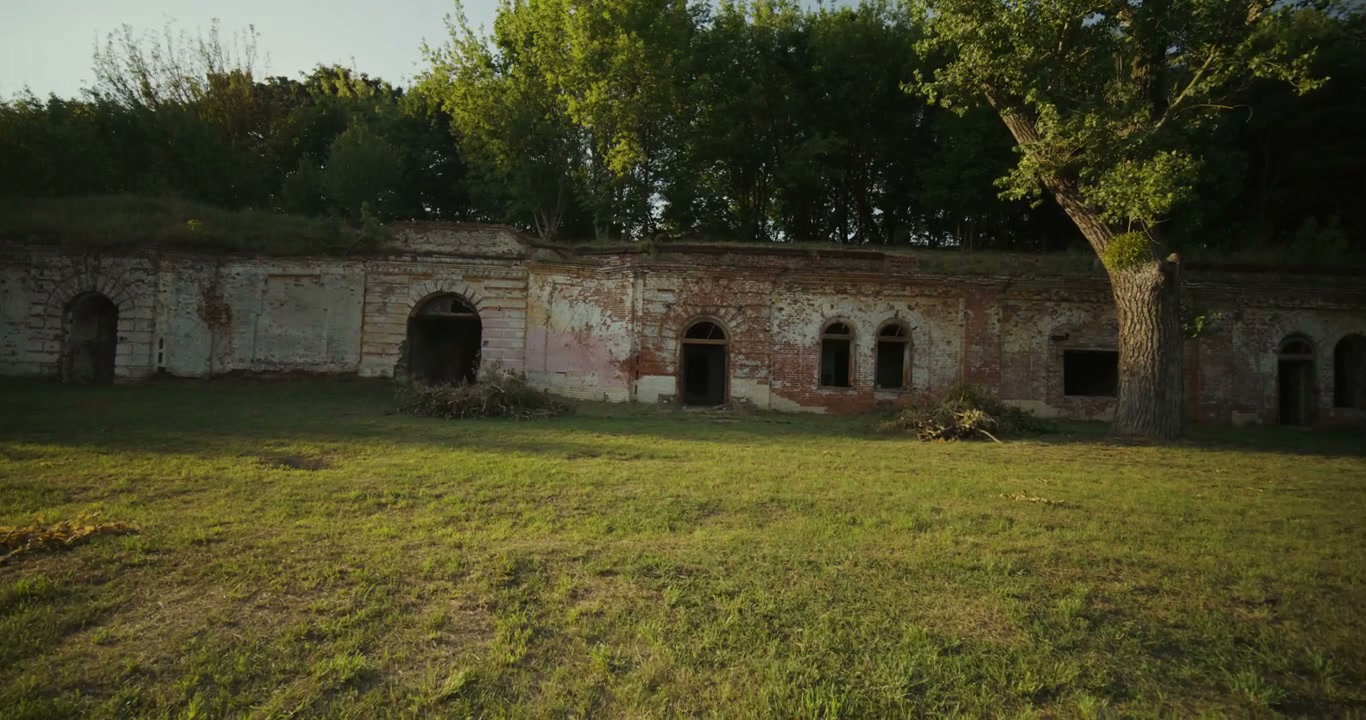 Friends Running Past Old Fortress