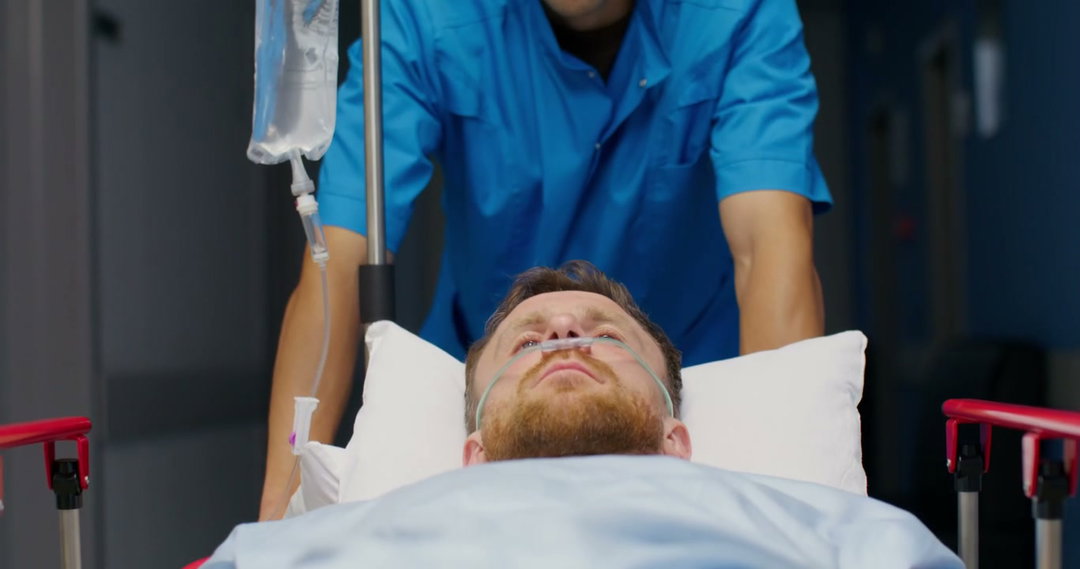 Medical Staff Rushing Patient Through Hospital Corridor • Stock Video ...