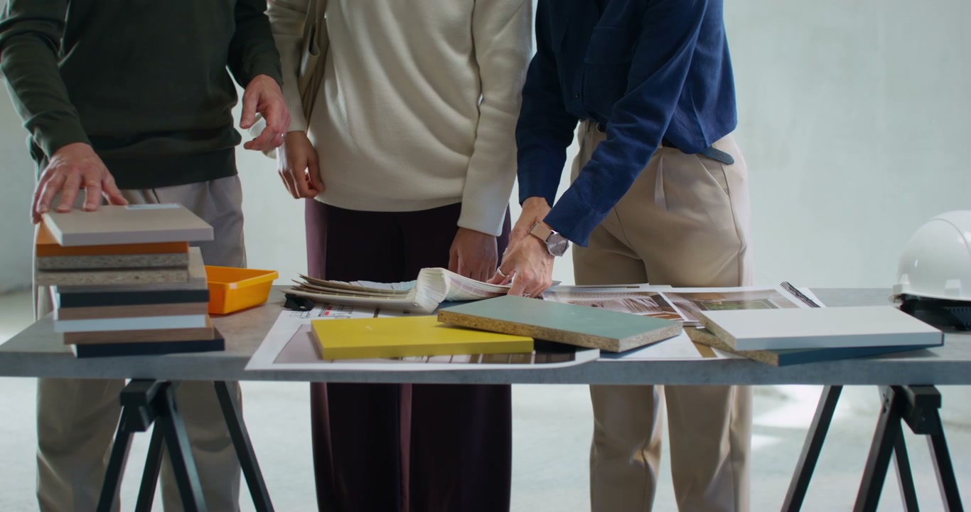 Designers and Clients Reviewing Material Samples