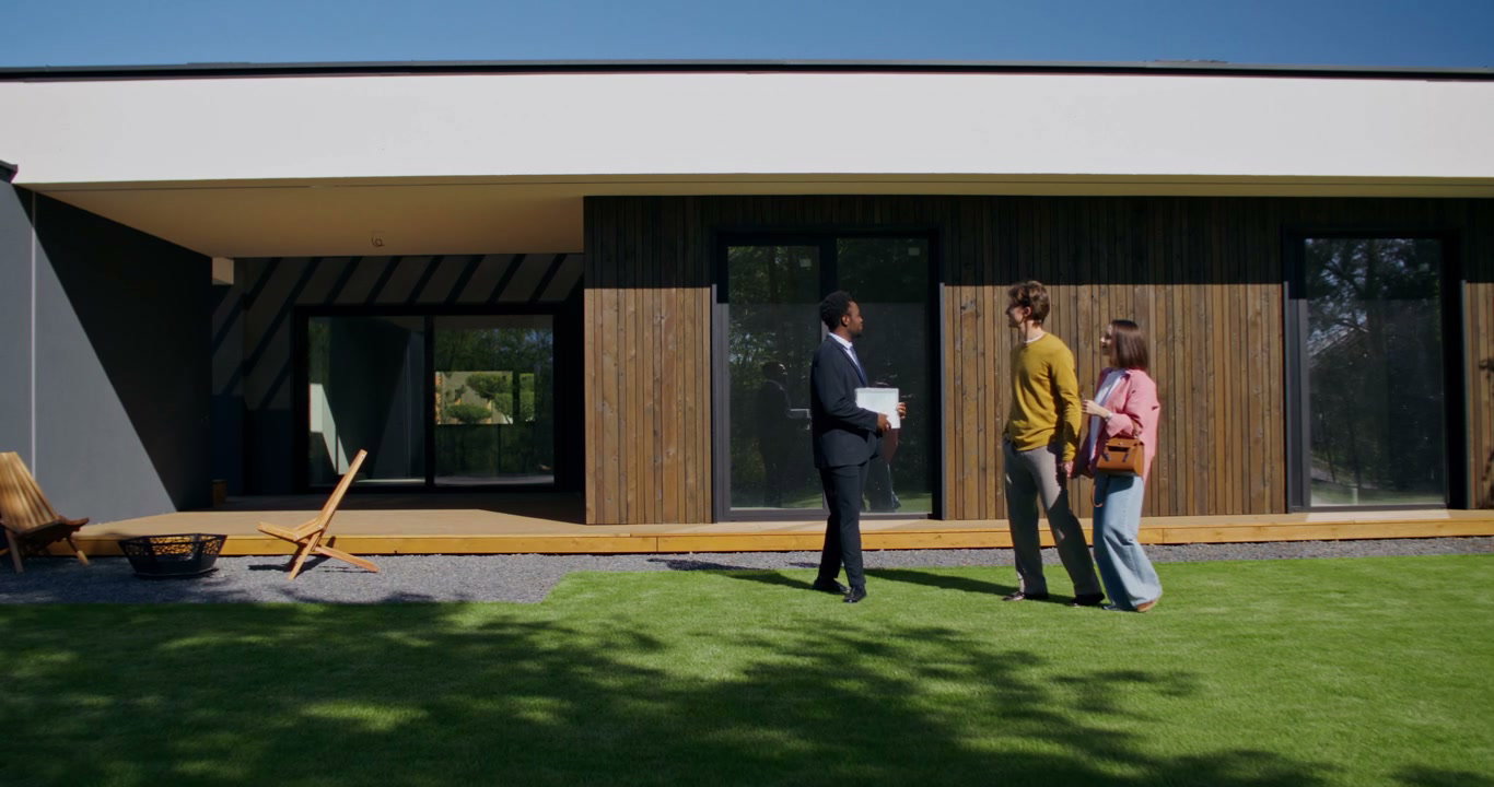 Realtor Presents Modern House to Couple