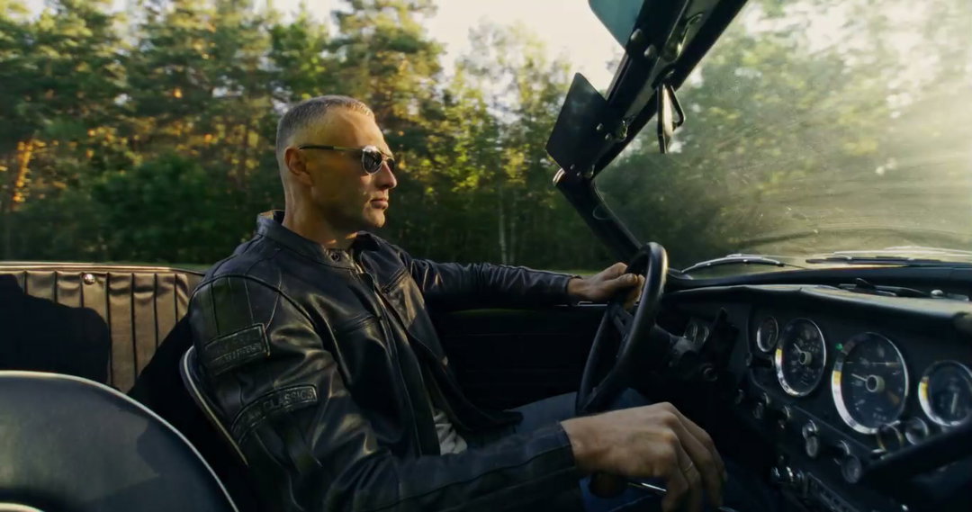 Man Riding Vintage Motorcycle on Scenic Road • Stock Video on Uppbeat