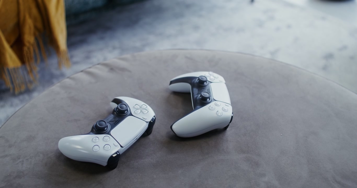 PlayStation 5 Controllers on Coffee Table