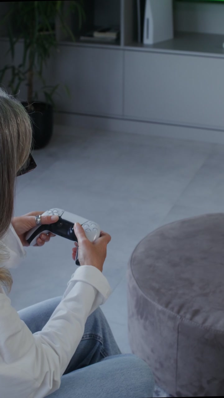 Woman Playing Video Game with Green Screen TV