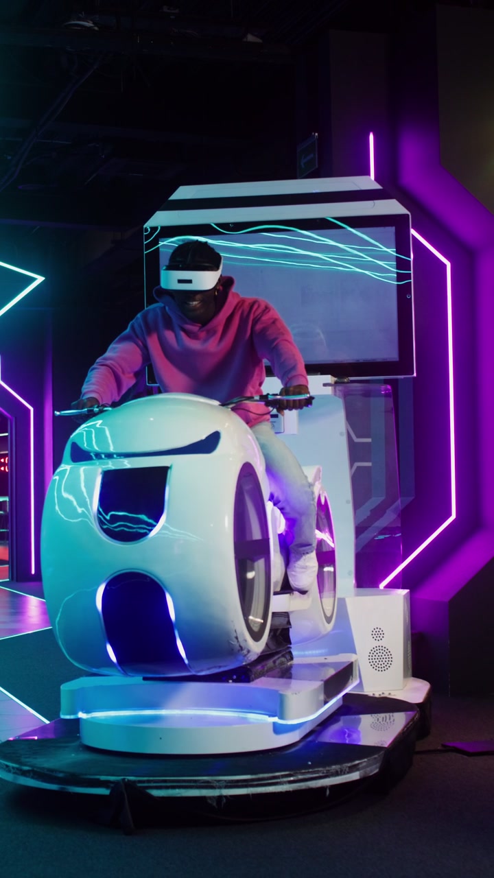 Gamer in VR Headset on Motorcycle Simulator