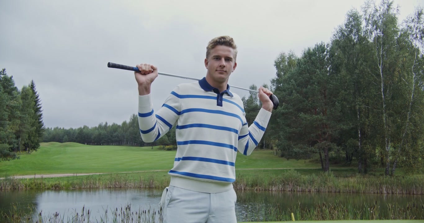 Golfer Posing on Golf Course