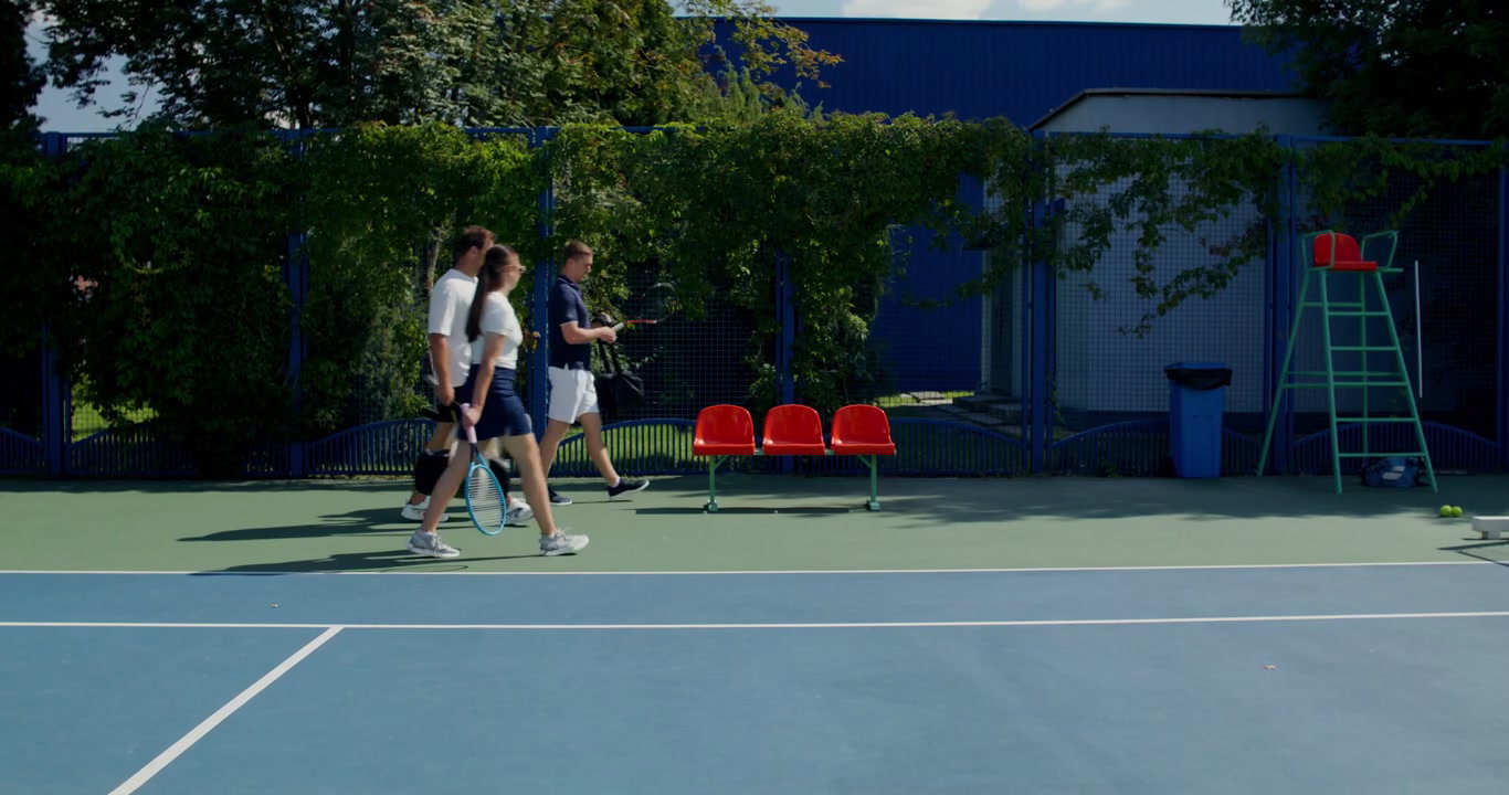 Friends Arriving at Tennis Court