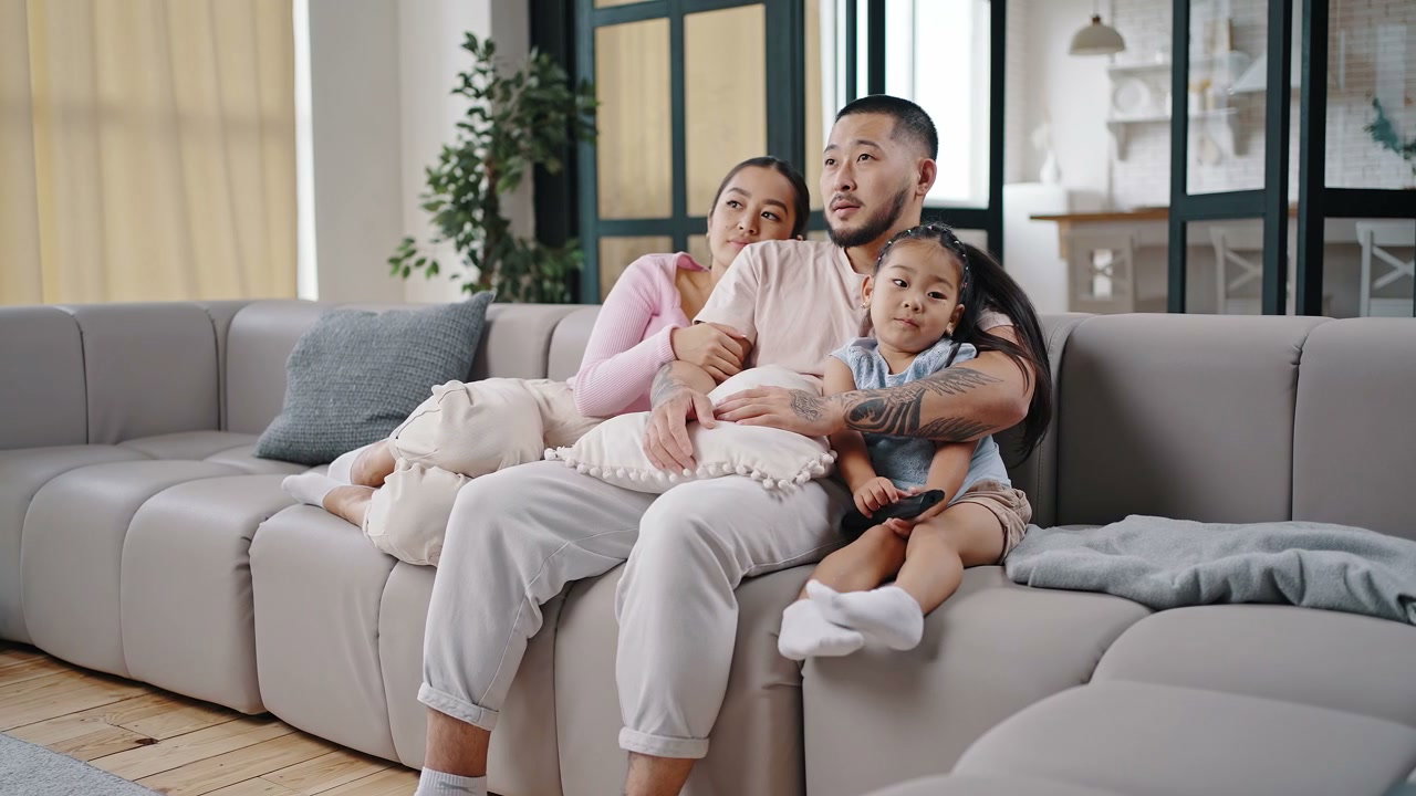 Family watching TV